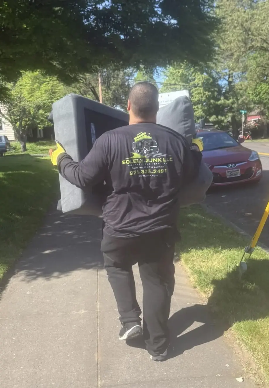 JunkPDX crew removing furniture